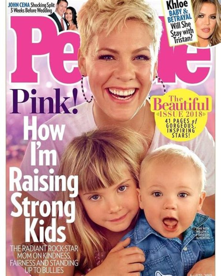 Prince George’s big brown eyes & first birthday cover this week’s People Mag